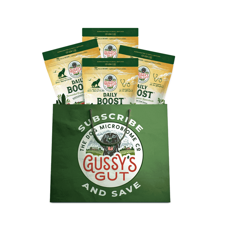 Green Gussy's Gut shopping bag with dog food packages on a white background